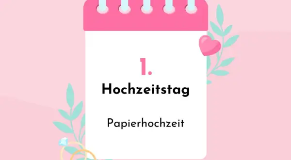 Der 1. Hochzeitstag, die Papierhochzeit, ist ein besonderer Meilenstein. Dekoriert mit Herzen und Blättern.