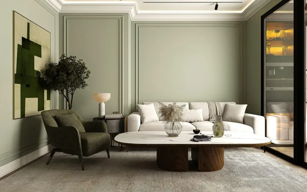 Ein stilvolles japandi style wohnzimmer mit einem beigen Sofa, einem grünen Sessel, einem ovalen Couchtisch und einem abstrakten Bild.